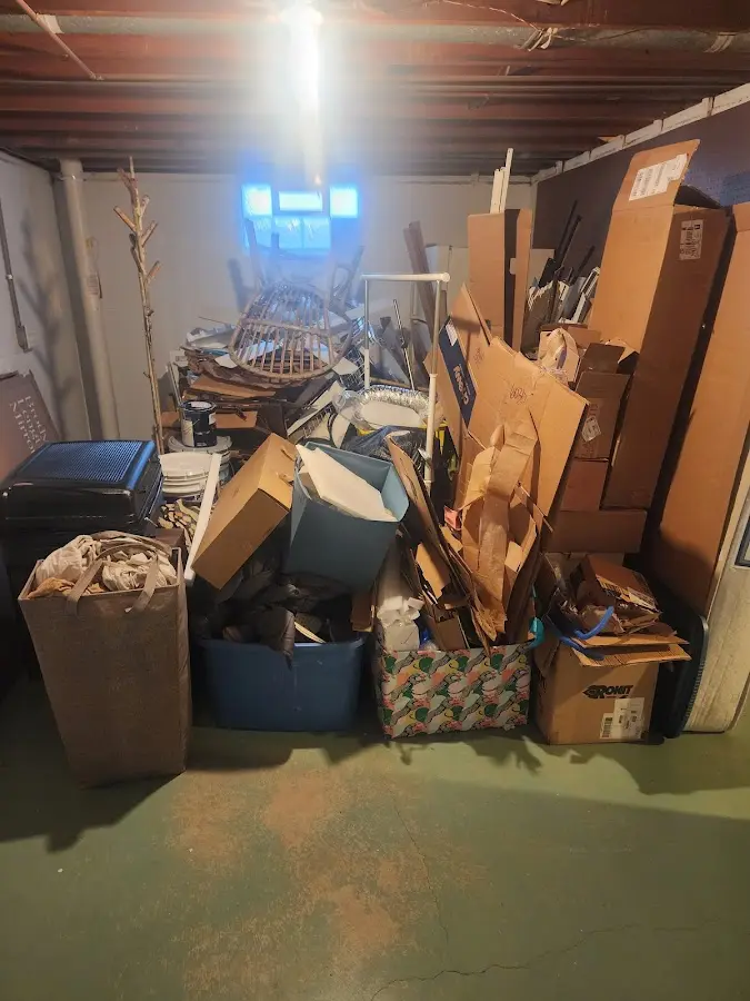 Roll-off dumpster container at job site for 15 Yard Dumpster Rental in Coloma